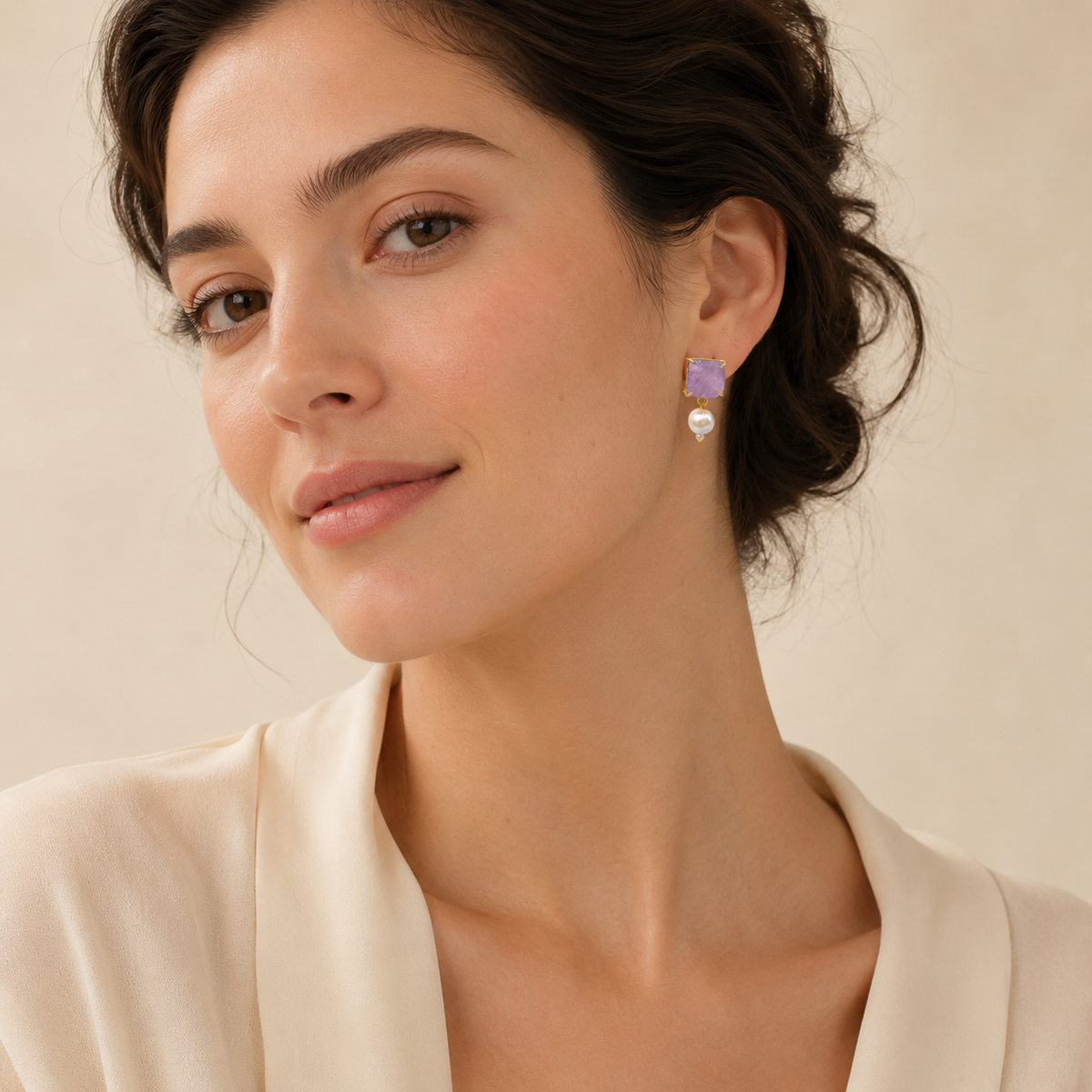 Lavender stone and pearl drop earrings with a gold-plated finish.