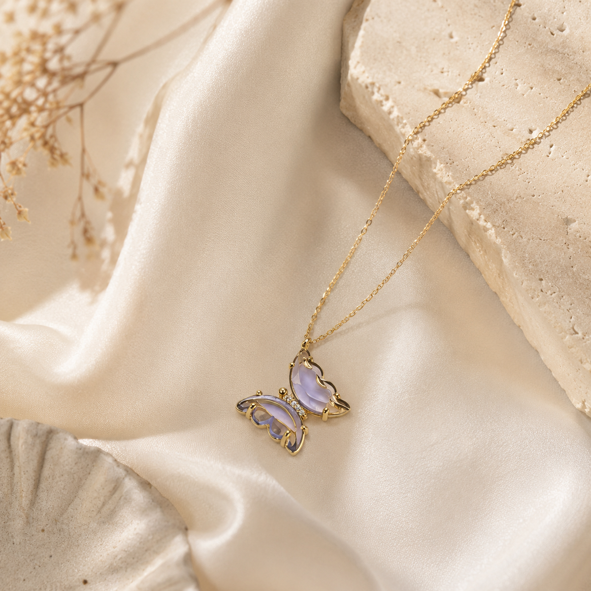 Purple butterfly pendant necklace with a delicate gold-tone chain