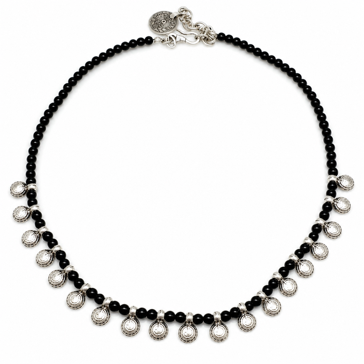 Black bead necklace with round silver-tone charms on a white background.