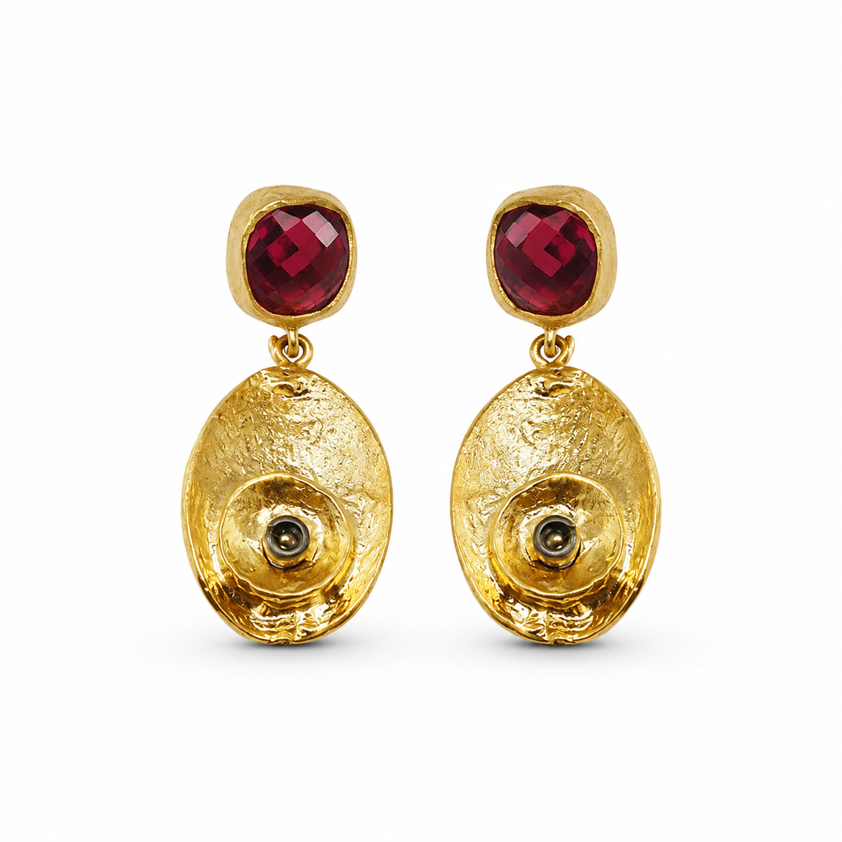 Gold-plated drop earrings with olive green stones and textured oval pendants.