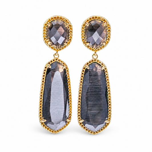 Gold-plated drop earrings with smoky gray faceted stones.