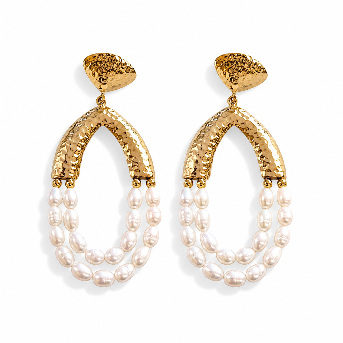 Pair of gold-tone chandelier earrings with hammered arches and layered pearl drops.