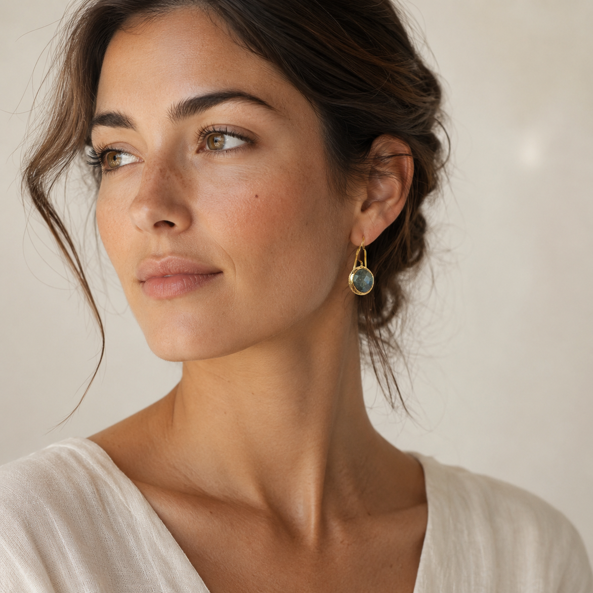 Faceted labradorite drop earrings in a polished gold-plated finish.