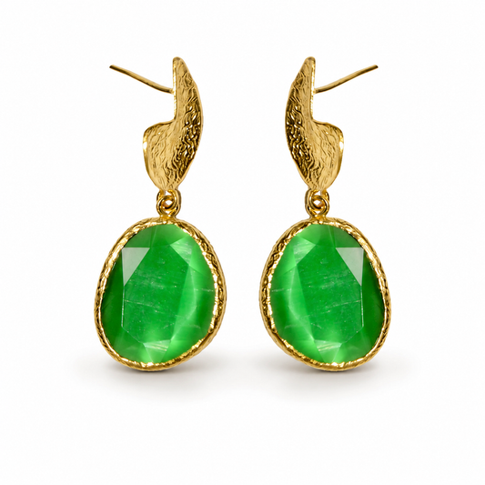 Pair of long drop earrings with bright green faceted stones and a textured gold-plated finish.