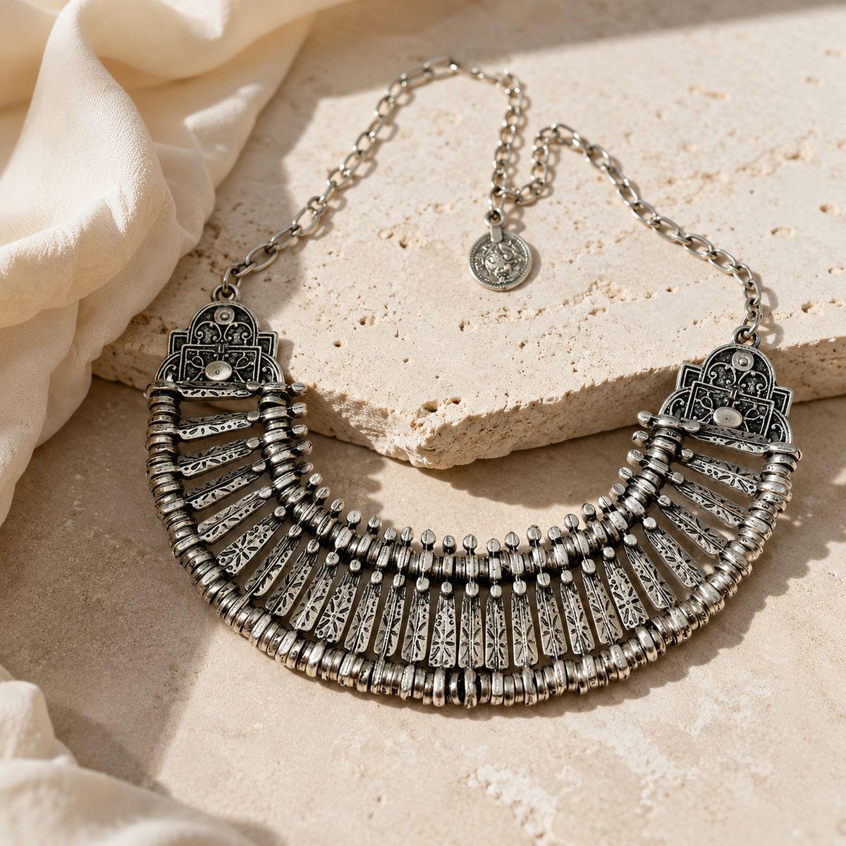 Silver-tone statement collar necklace with layered fan elements