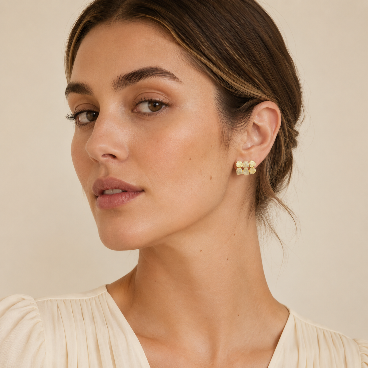 Rough citrine stud earrings with a warm gold finish and natural stone texture.
