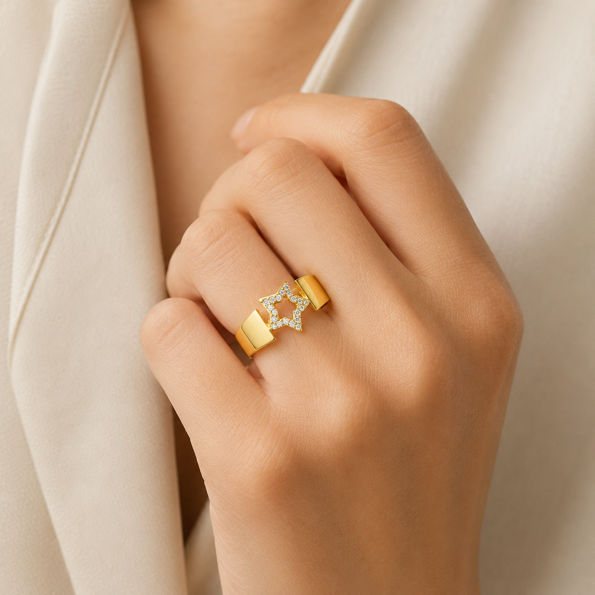Gold-plated statement ring with a star-shaped CZ detail.