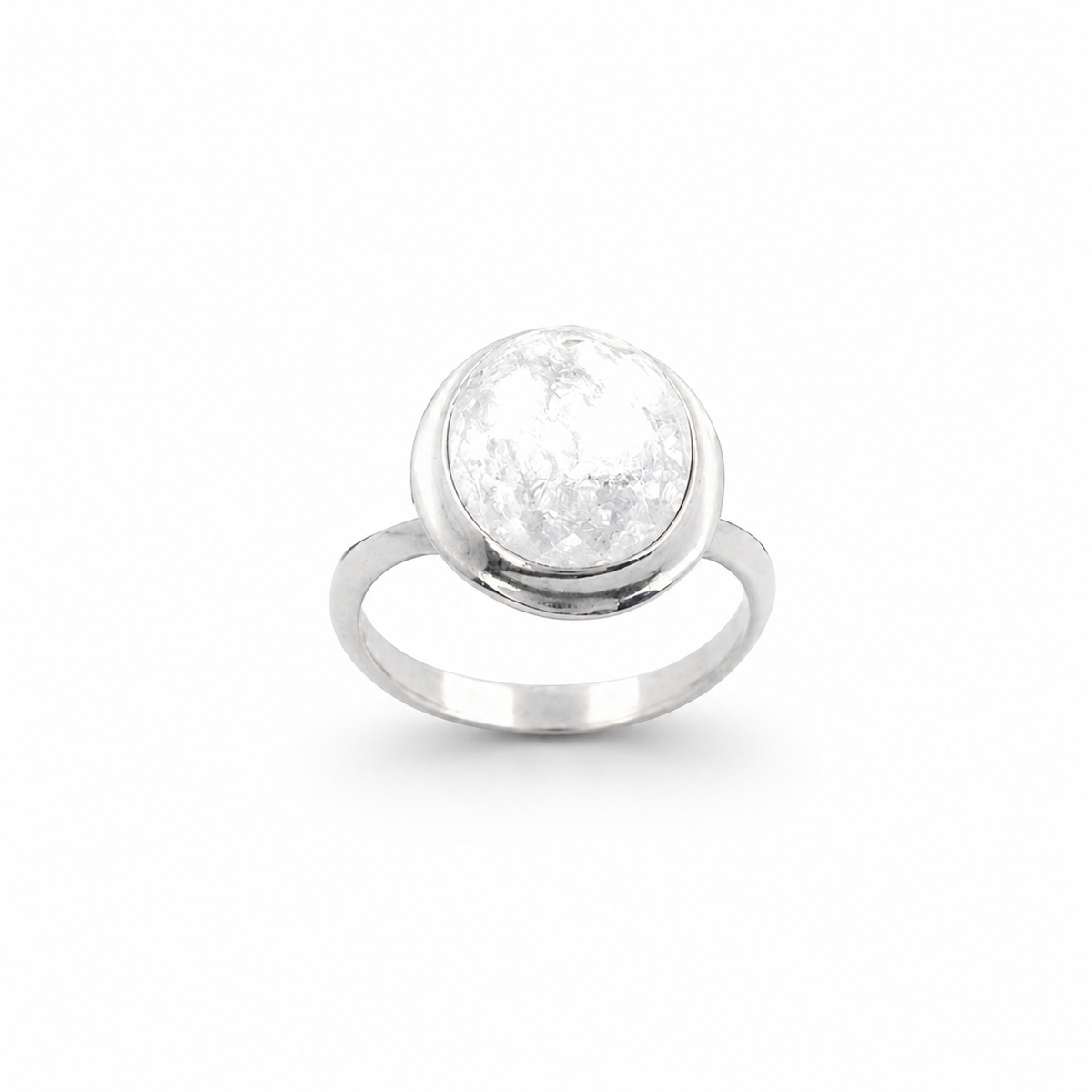 Minimalist silver-tone ring with a clear quartz-inspired round center stone.