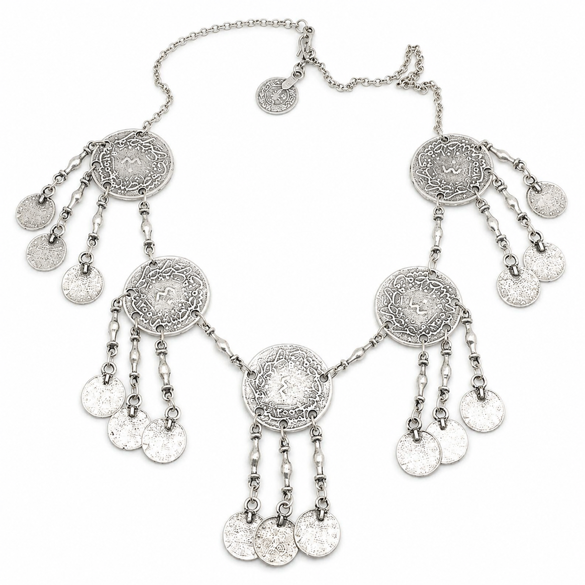 Silver-tone necklace with round coin pendants and fringe details on a white background.