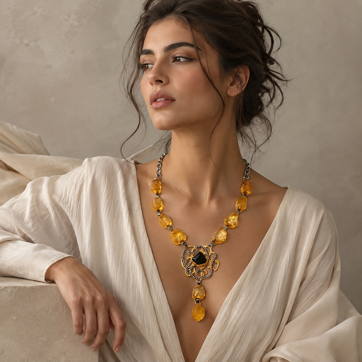 Citrine medallion drop necklace styled as a statement piece.