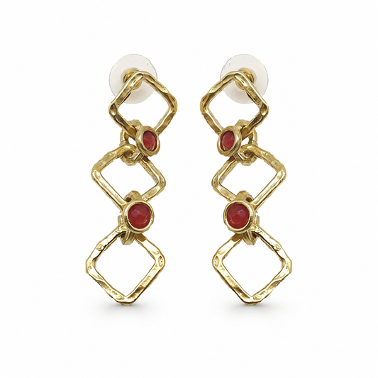 Gold-tone chain drop earrings with linked geometric shapes and red stone accents.