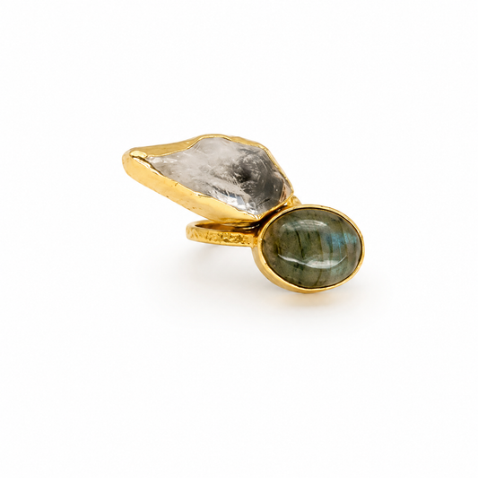 Gold-plated ring with a clear quartz stone and a labradorite stone.