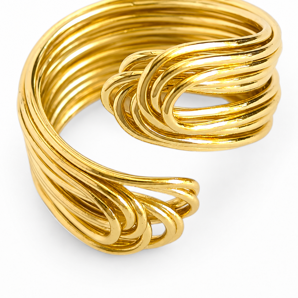 Close view of the layered gold-plated bands and knot detail.