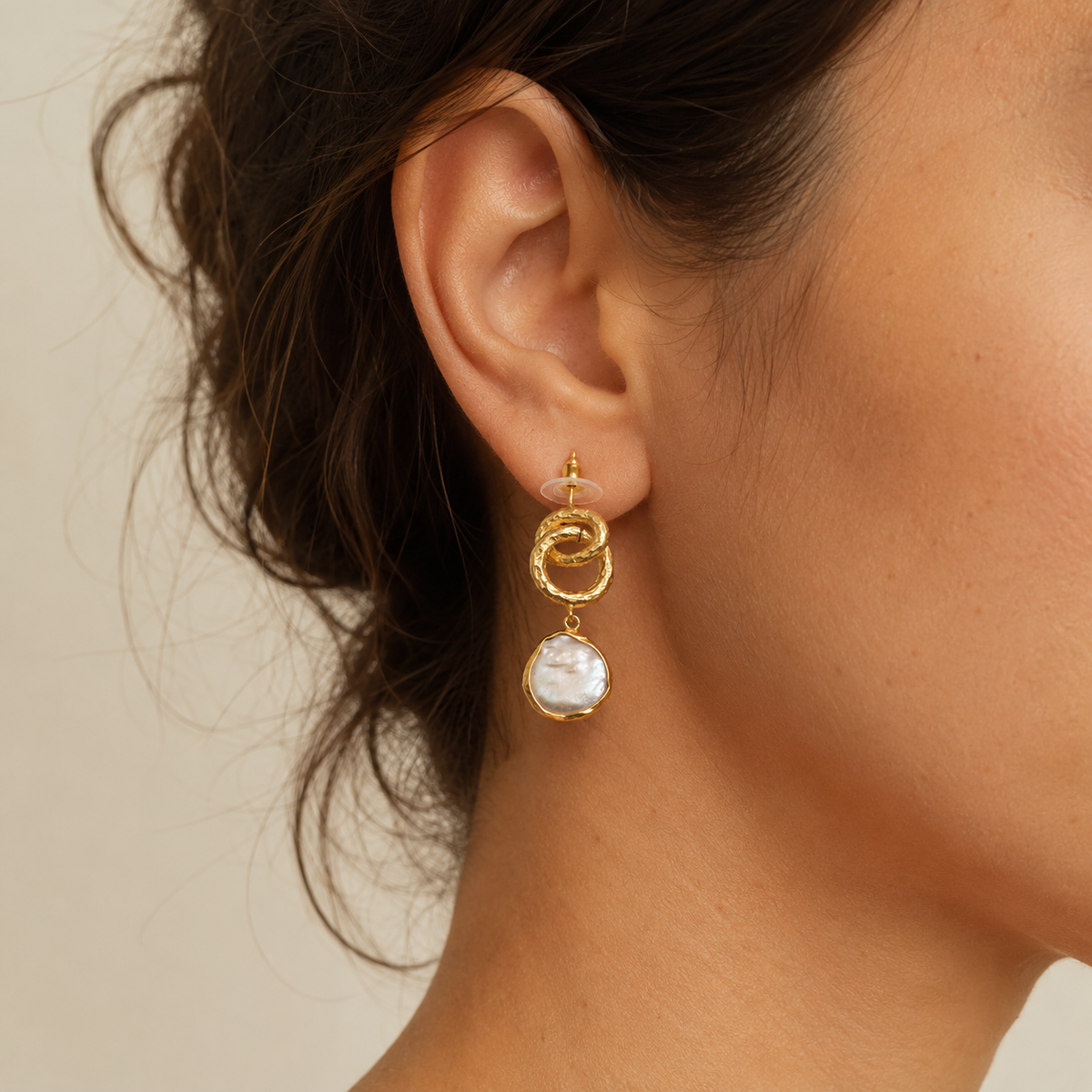 Gold plated drop earrings shown front view on a white background.