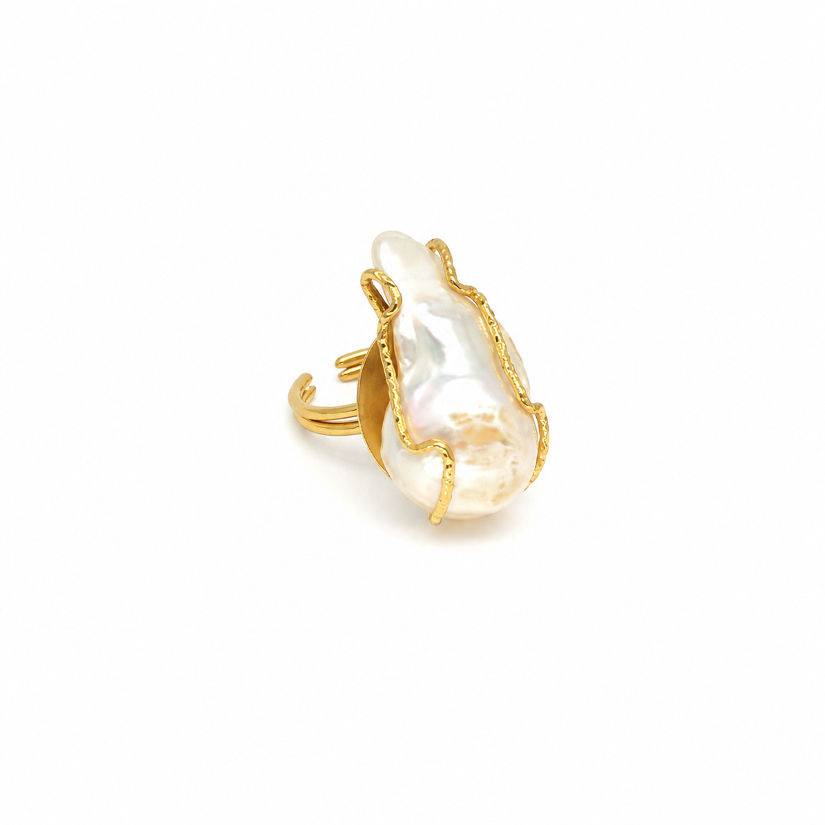 Baroque pearl statement ring with a gold-plated setting on a white background.
