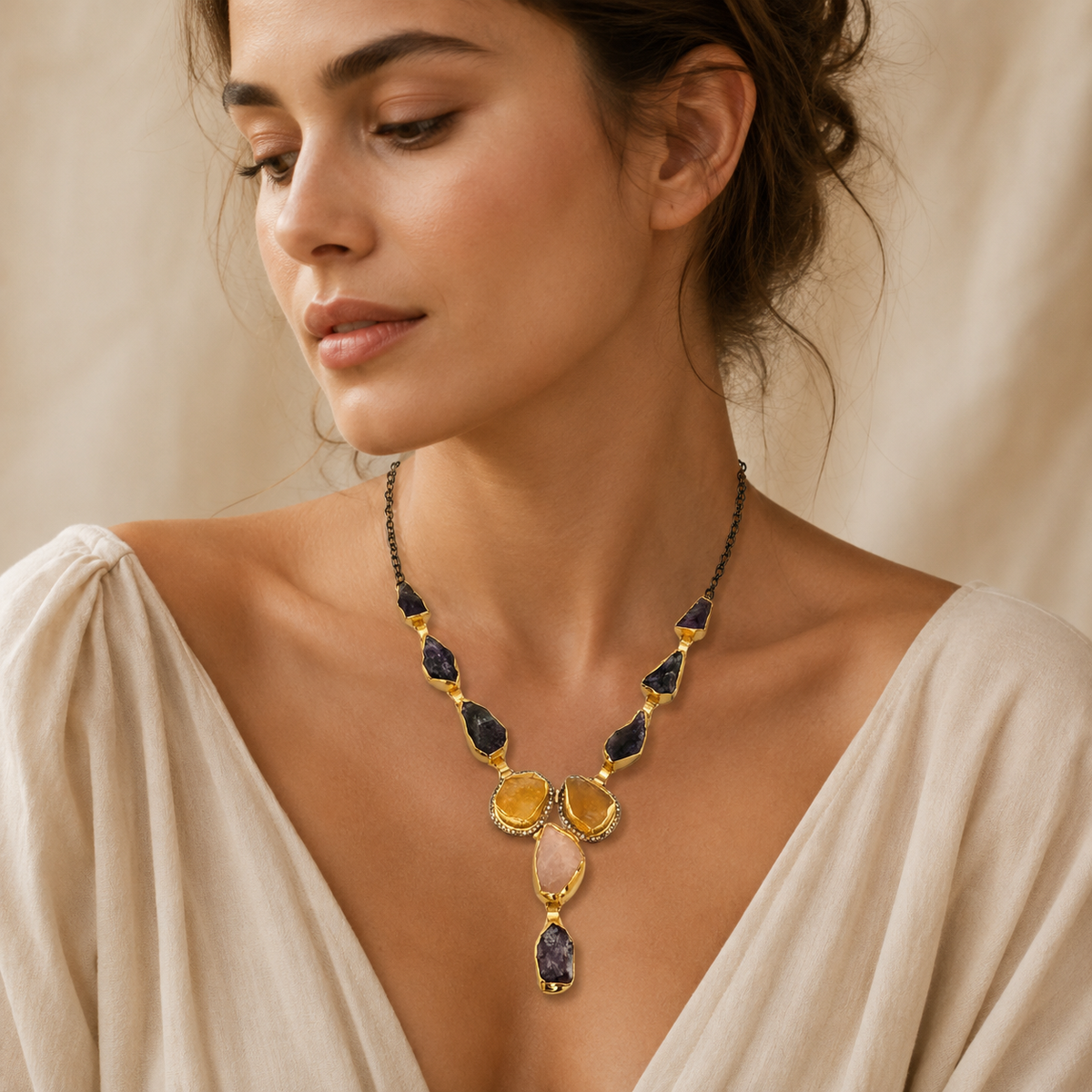Mixed gemstone Y drop necklace with a bold pendant silhouette.