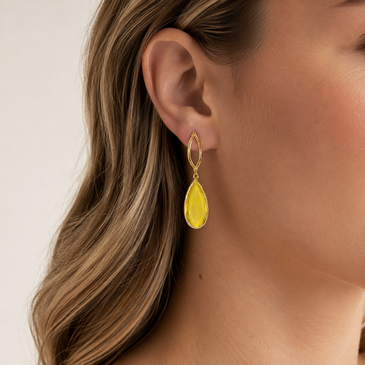 Gold plated mustard drop earrings shown front view on a white background.