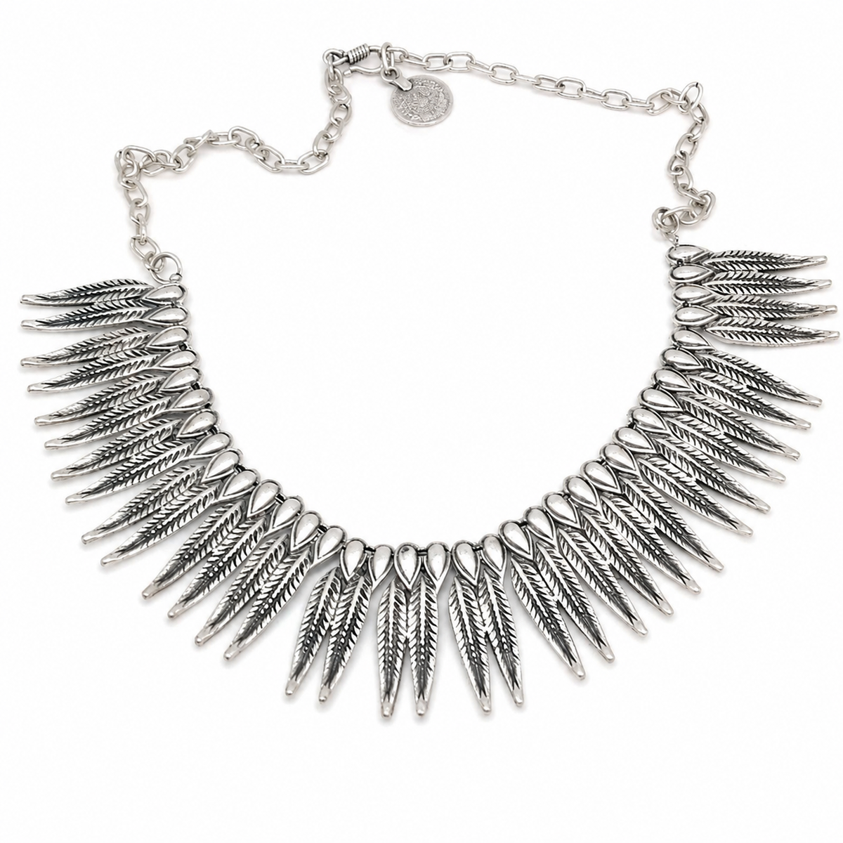 Silver-tone collar necklace with leaf-inspired spike details.