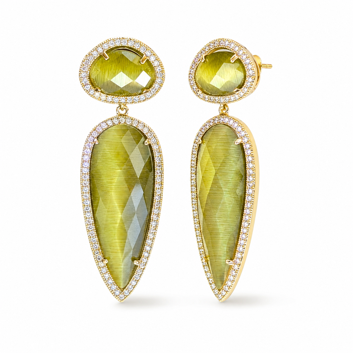Side angle view of olive cat eye teardrop earrings with a gold-plated frame.