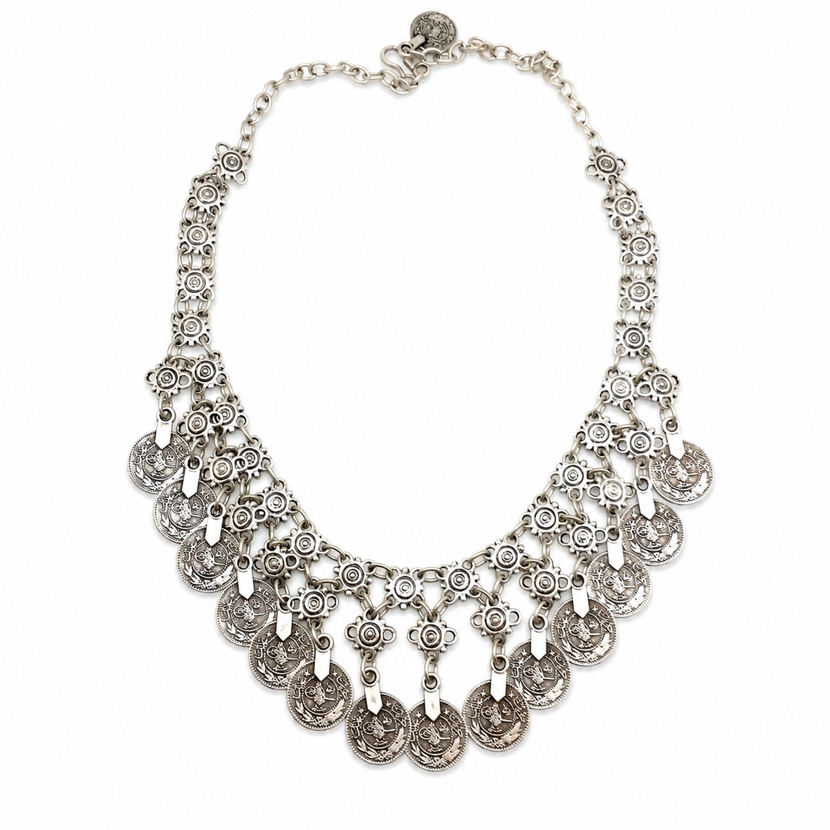 Silver-tone statement necklace with floral coin fringe and layered detail.