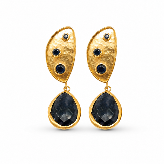 Gold plated half moon dangle earrings with dark stone accents.
