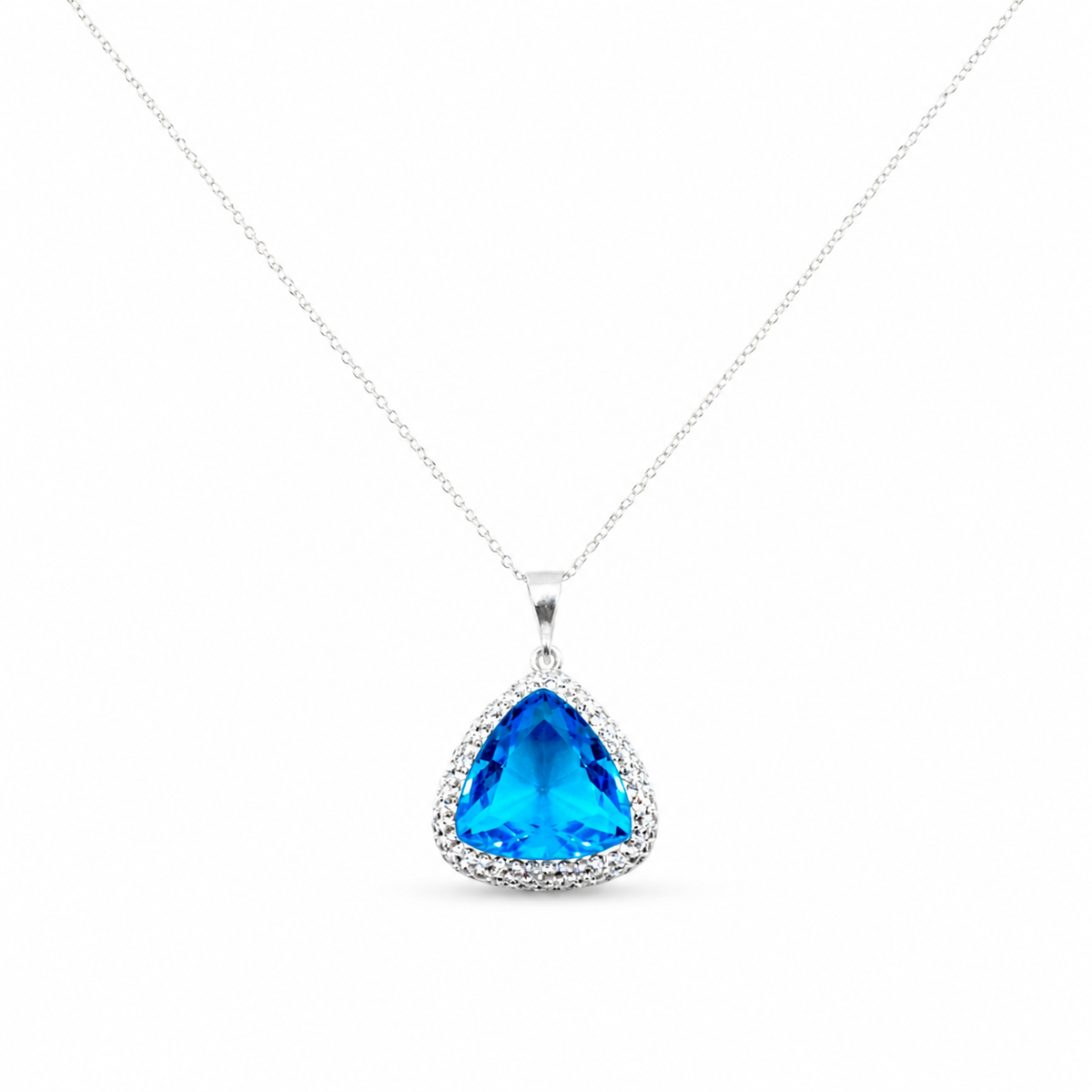 Triangle pendant necklace with a baby blue faceted stone and silver-tone chain.