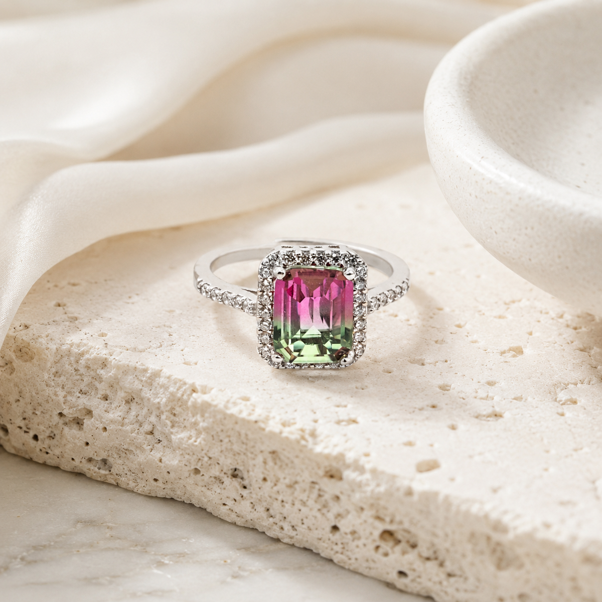 Silver-tone ring with a bold purple stone and slim band.