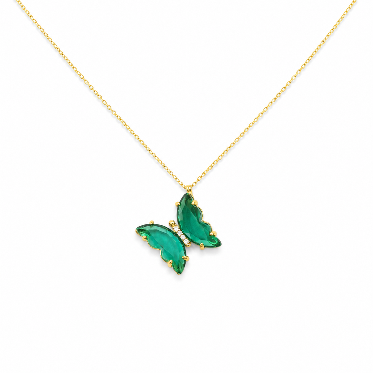 Green butterfly pendant necklace with a gold-tone chain on a white background.