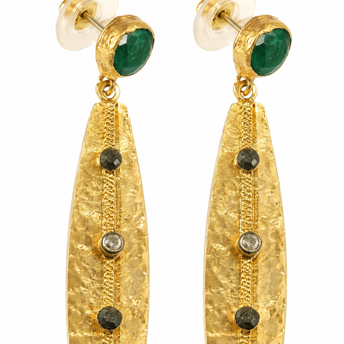 Close view of the textured gold drop and green stone detail.