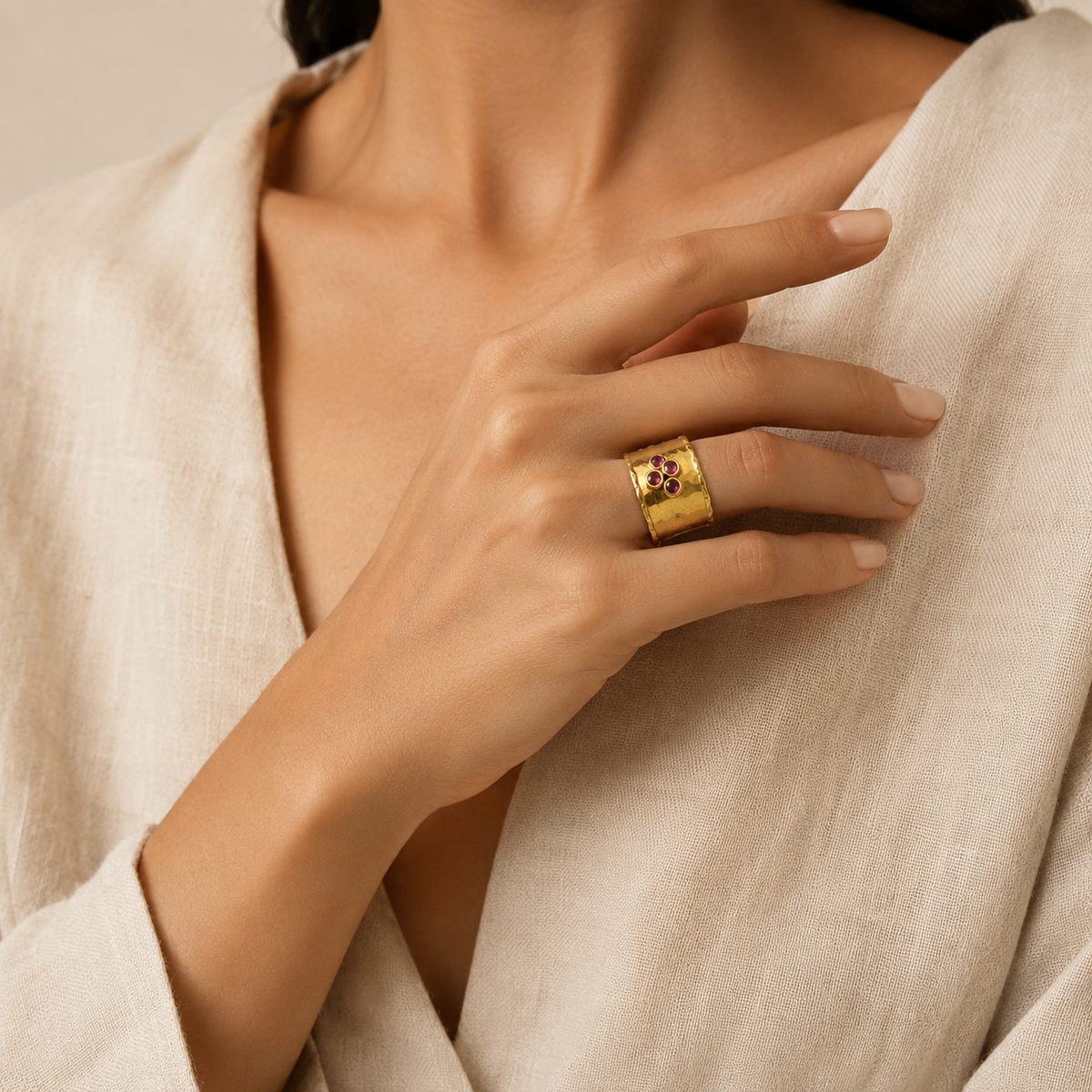 Ruby pink three stone cuff ring in a gold-plated finish.