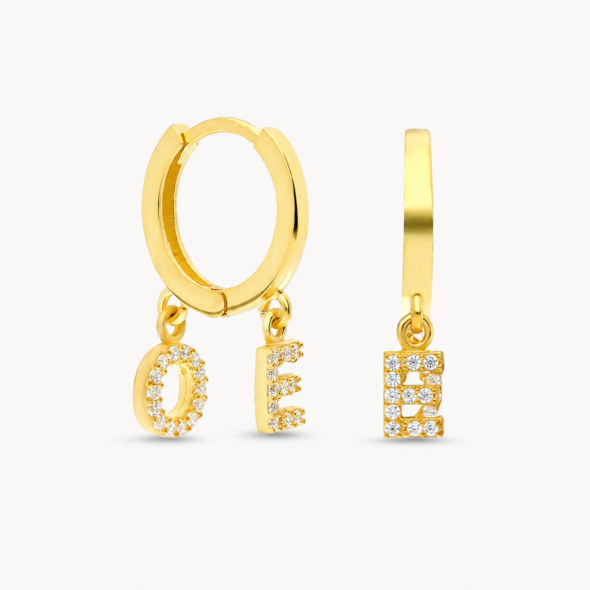Gold-tone hoop earrings with two CZ initial charms.