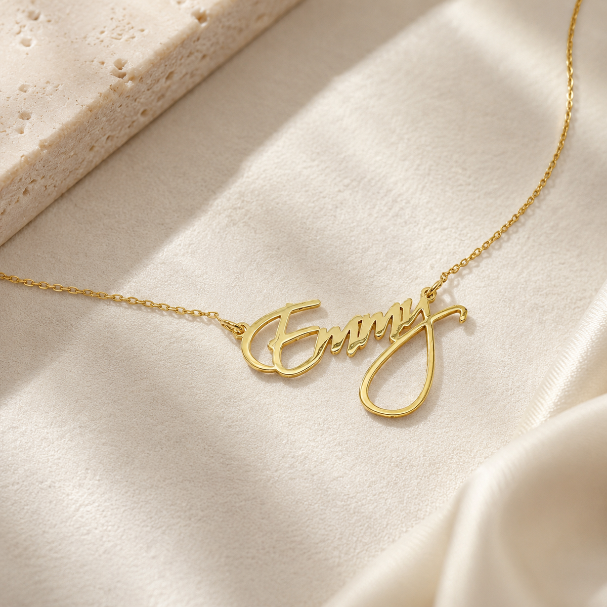 Personalized script name necklace with a delicate chain.