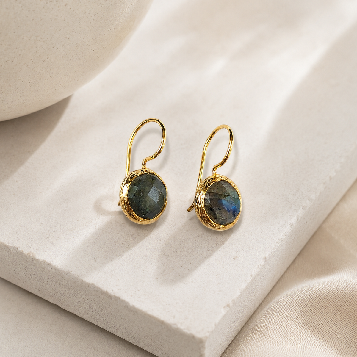 Gold-plated labradorite drop earrings with a softly textured setting.