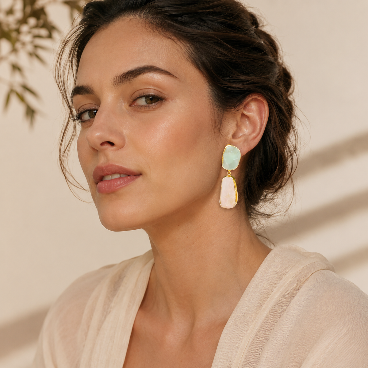 Statement drop earrings with green and pink natural-looking stones.