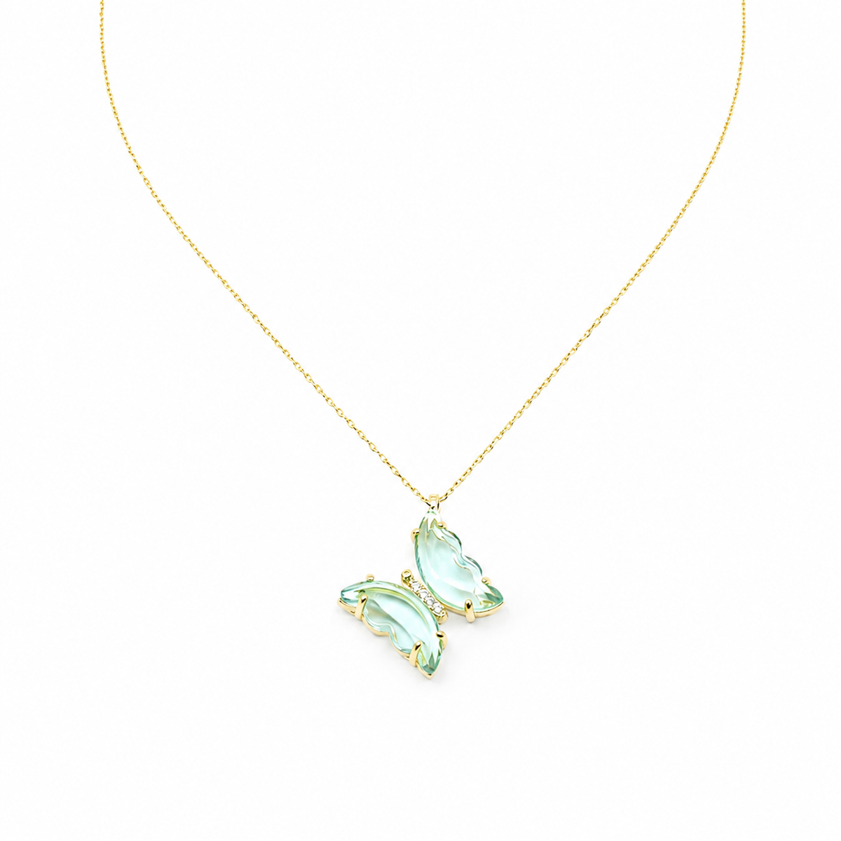 Light blue butterfly pendant necklace with a slim gold-tone chain.