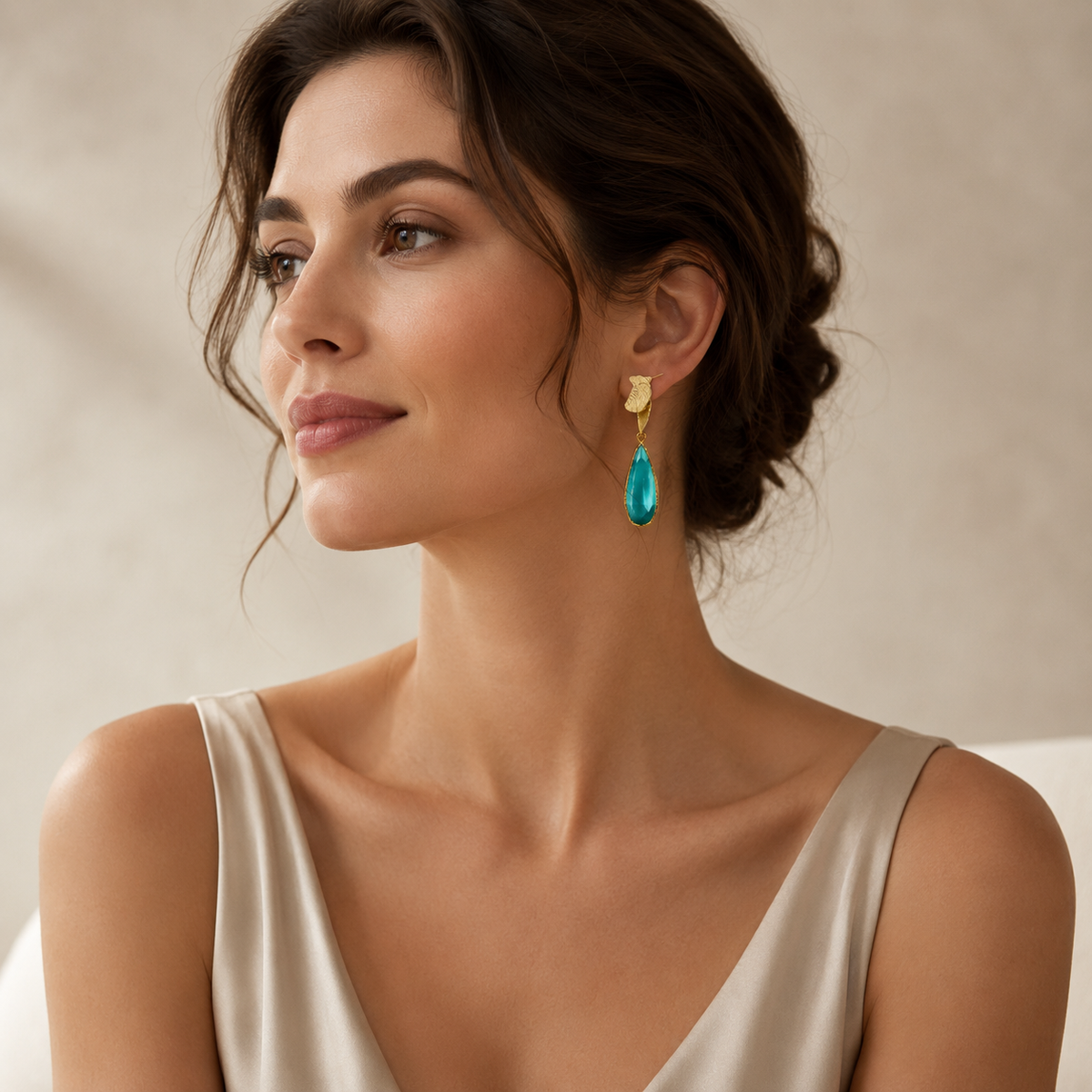 Gold-plated turquoise drop earrings shown front view on a white background.