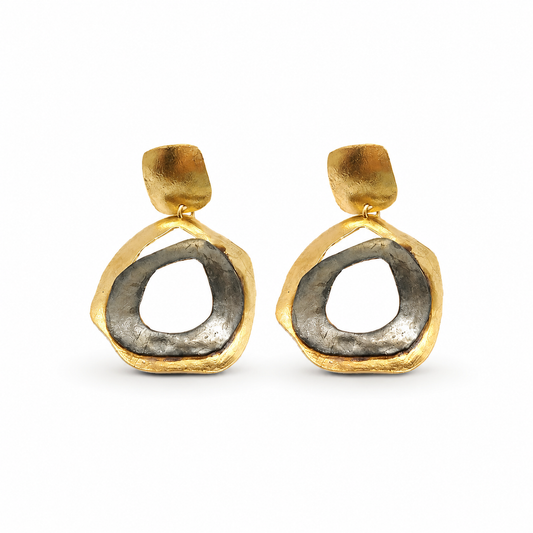 Pair of abstract circle drop earrings with a two-tone gold and silver look.