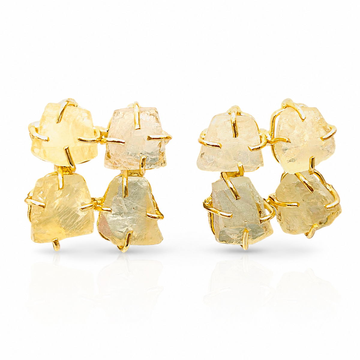Rough citrine gold plated stud earrings with an organic shape and warm golden tones.