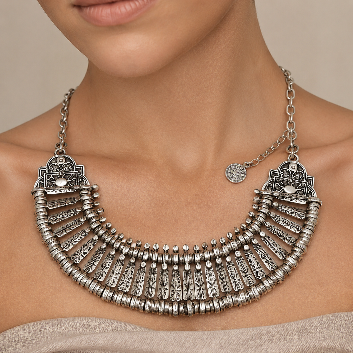 Silver-tone boho collar necklace shown front view on a white background