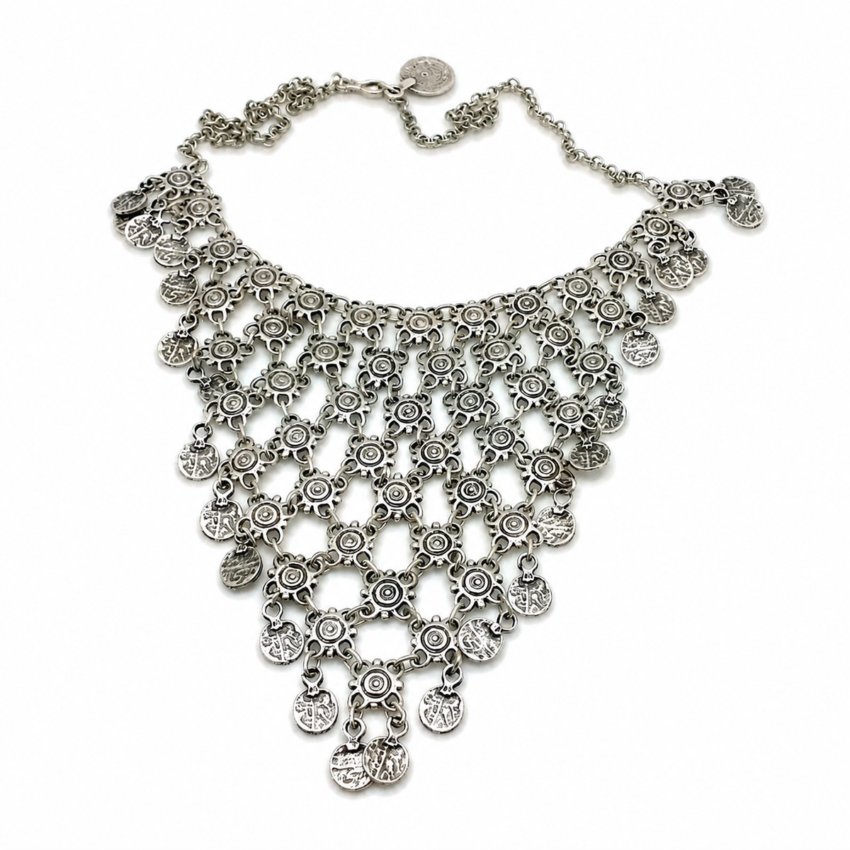Silver-tone necklace with layered coin charms and a cascading dangle silhouette.