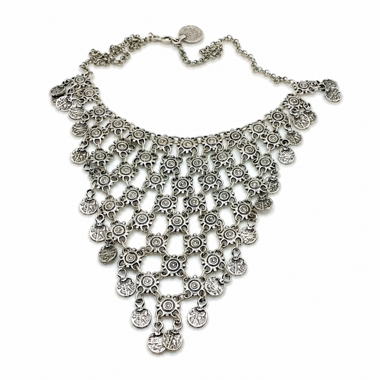 Silver-tone necklace with layered coin charms and a cascading dangle silhouette.