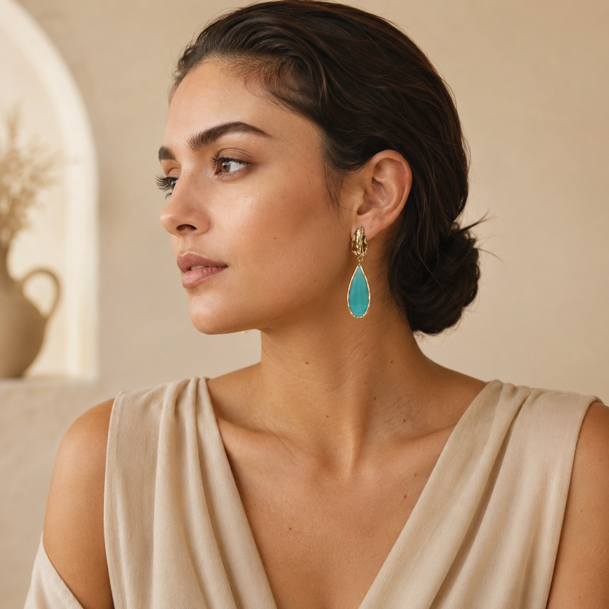 Gold-plated leaf drop earrings with pine green teardrop accents.