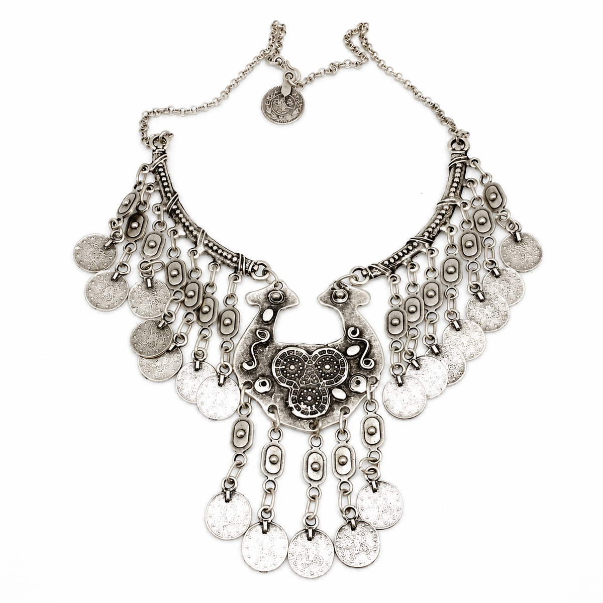 Silver-tone statement necklace with ornate coin fringe and layered charms.