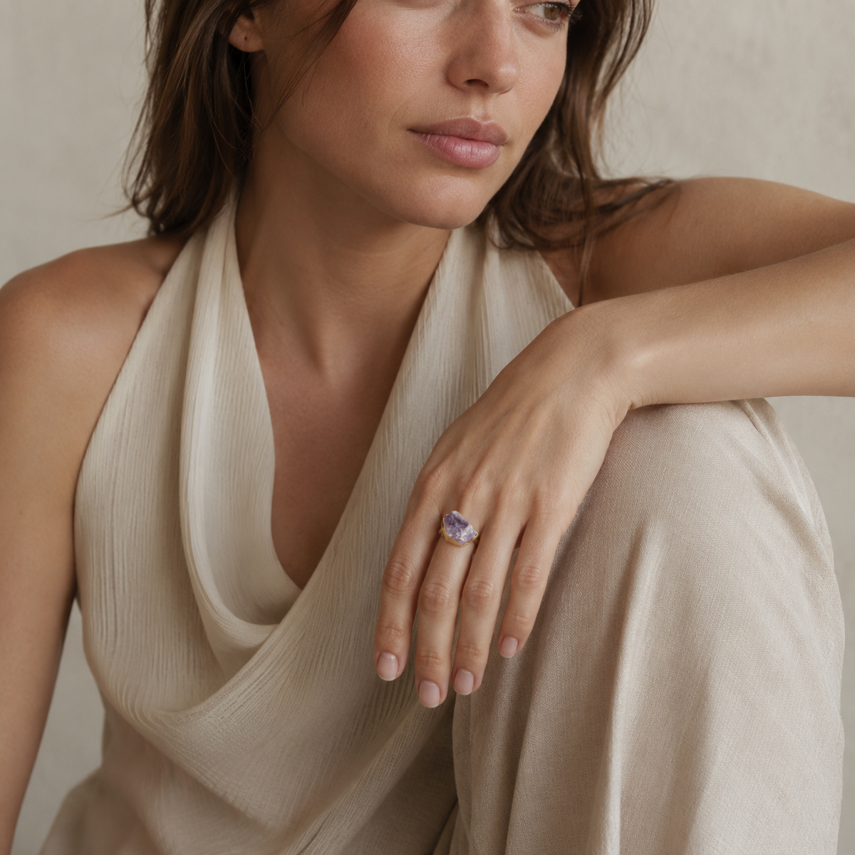 Raw amethyst ring with a bold gold-plated silhouette.