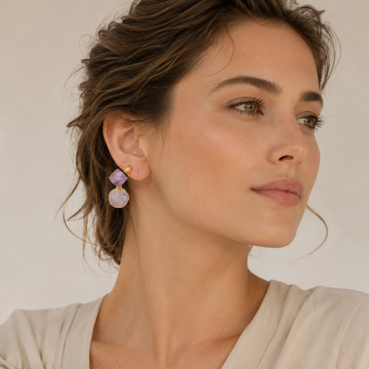 Pair of rough amethyst drop earrings with a gold-plated finish.