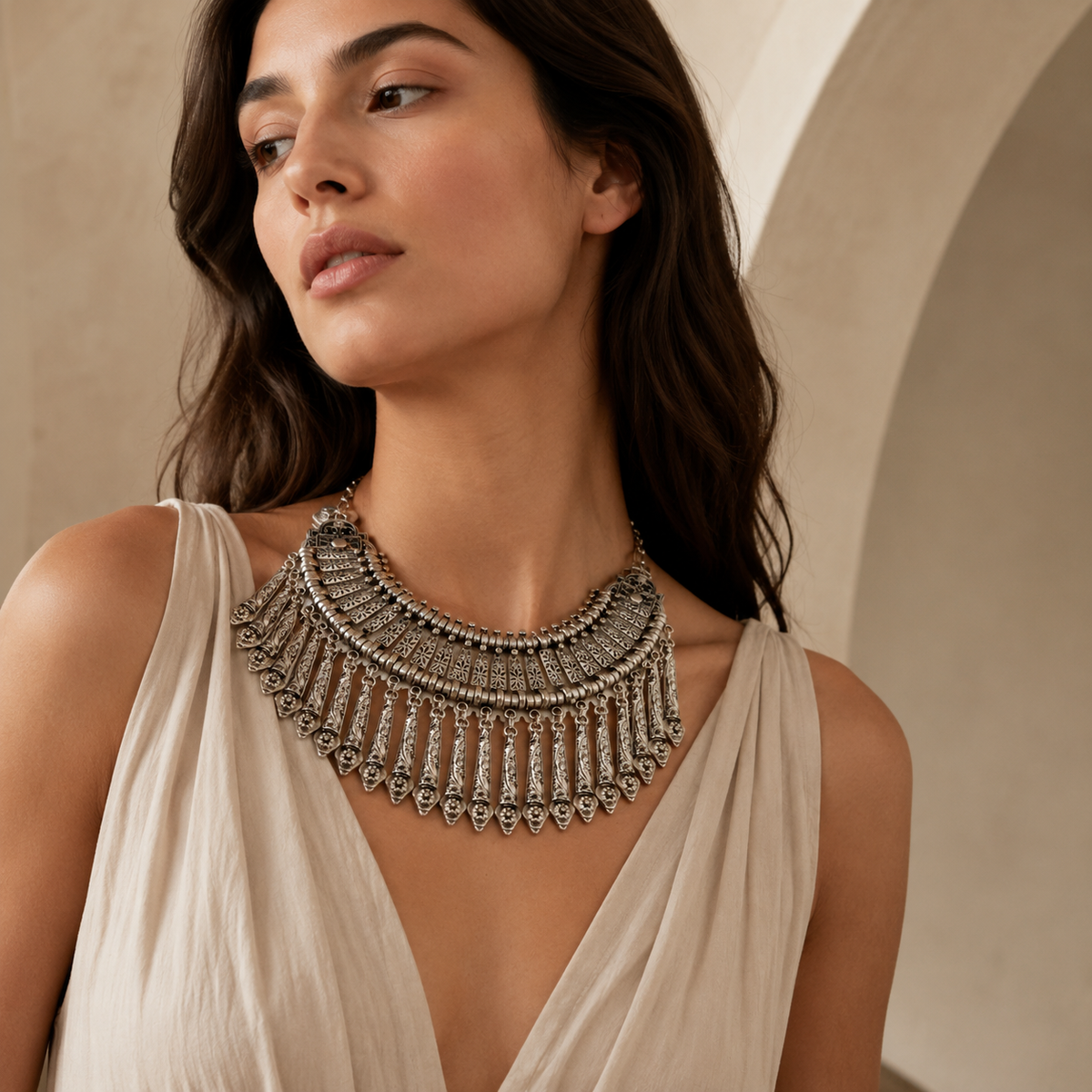 Silver-tone boho collar necklace with ornate paddle fringe and detailed metalwork.