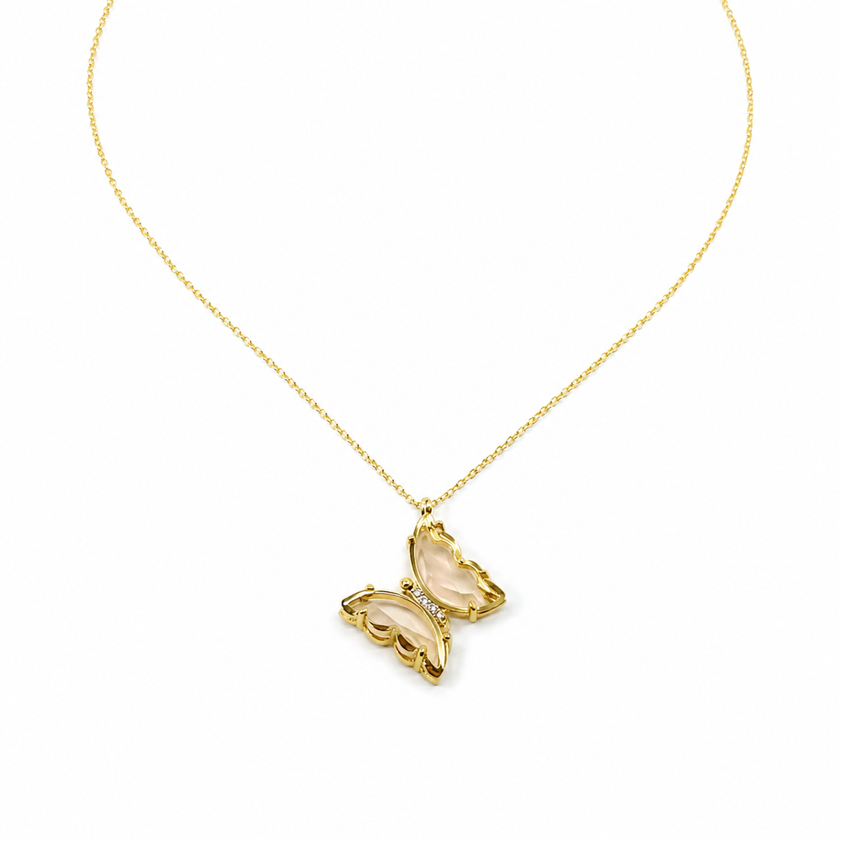 Pink glass butterfly necklace with a gold-tone chain on a white background.