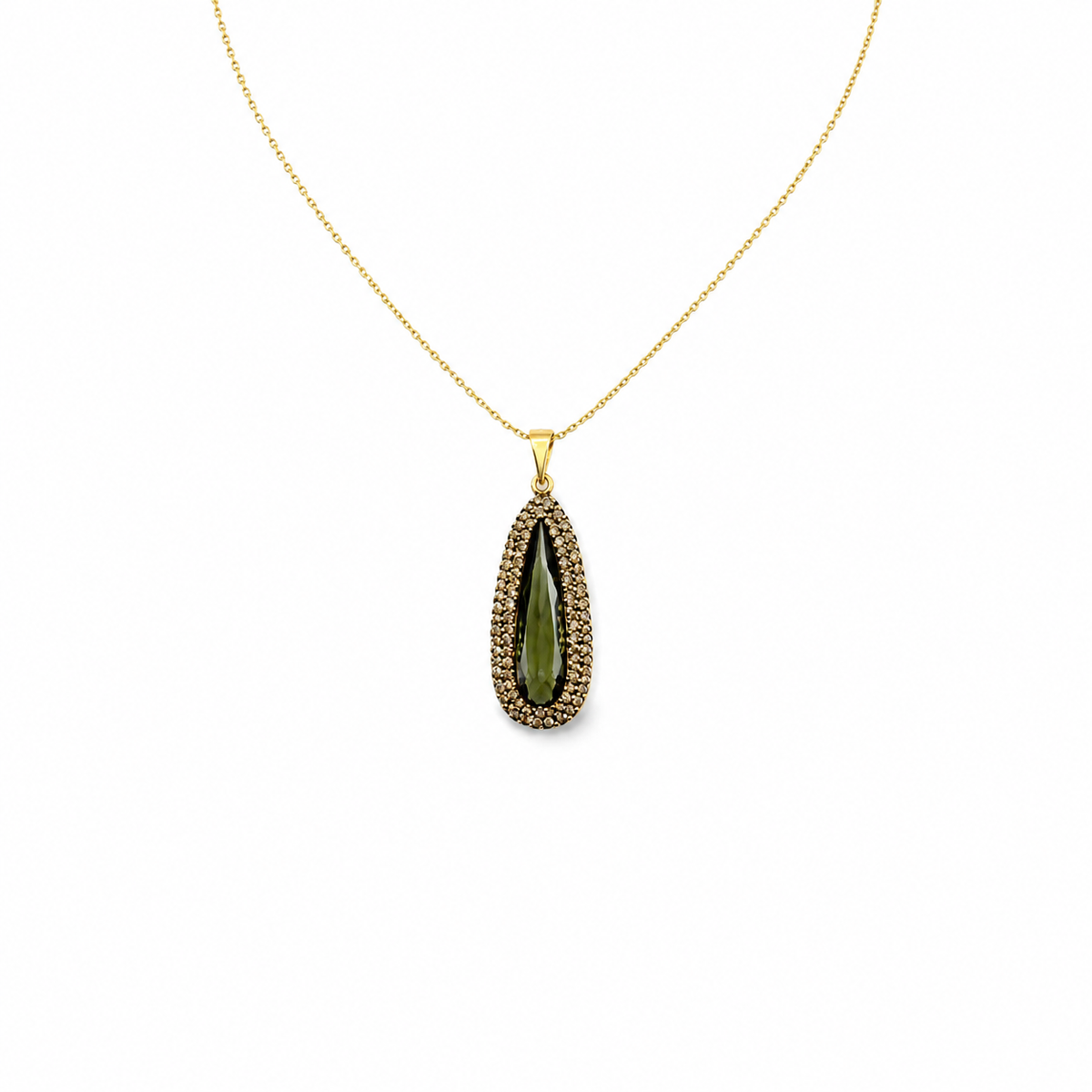Angled view of a gold-tone teardrop pendant necklace.
