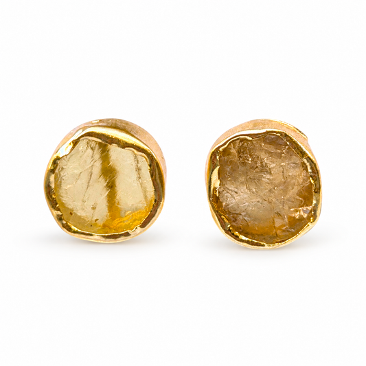 Pair of rough citrine stud earrings with a handmade gold setting.