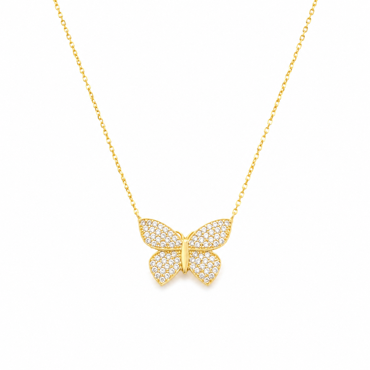 Gold-tone butterfly pendant necklace with sparkling detail on a fine chain.